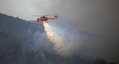 Saruhanlı'da ki Orman yangını kontrol altına alındı soğutma çalışmaları sürüyor