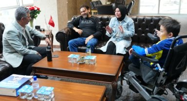 Başkan Okur'dan DMD hastası Şenol Berk'e anlamlı sürpriz
